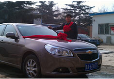 超前涂料獎勵員工轎車，真石漆生產(chǎn)廠家！